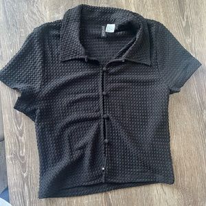 Black button up top